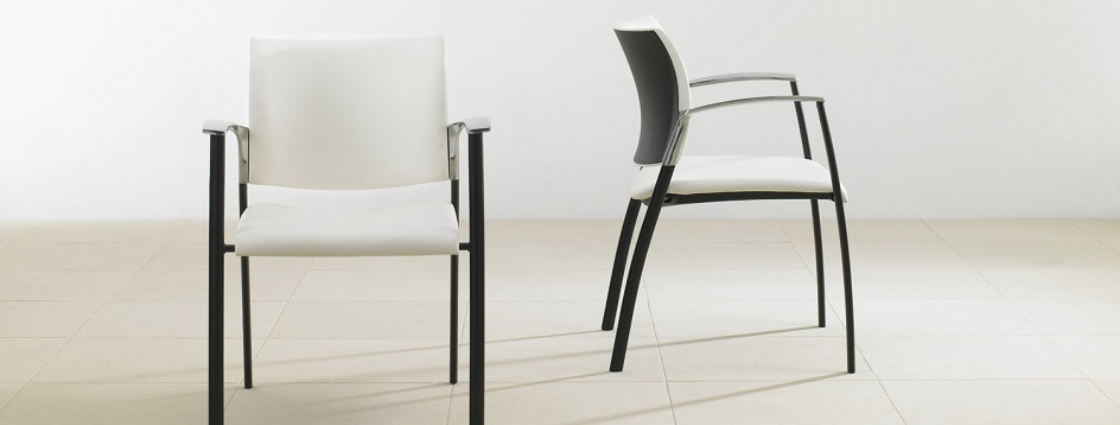 white conference chair with black legs and handles